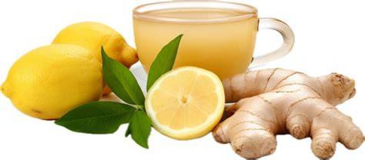 a cup of lemon ginger tea with honey