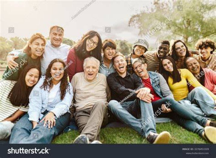 a group of people in a meeting