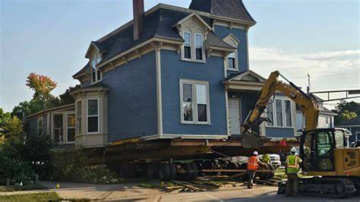 A house that was moved off its foundation during the tornado sits in the street about 9 metres away in Arabi. Photo / AP