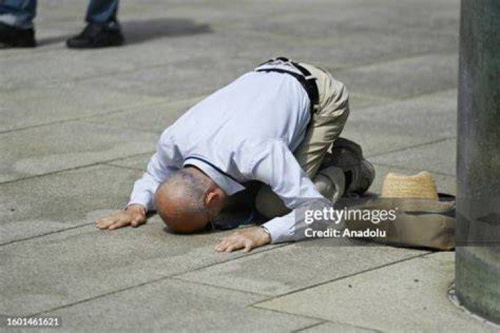 A man bows to pay tribute to victims near the scene of a deadly accident in Seoul, South Korea. AP Photo/Ahn Young-joon