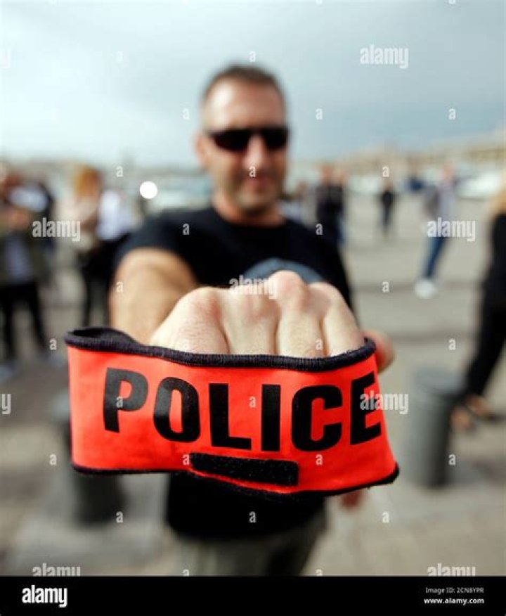 A plain-clothes police officer holds a rifle as they launched a major chase for a man who claimed to have shot and killed his wife while broadcasting it live on Instagram, in the small town of Gradacac, Bosnia. Photo / AP