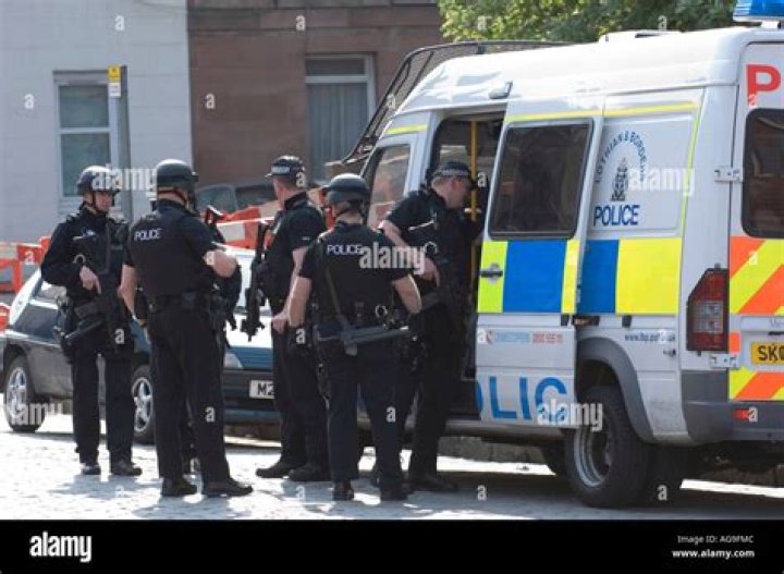 Armed police officers near the scene of a shooting in Hamburg, Germany. Photo / AP