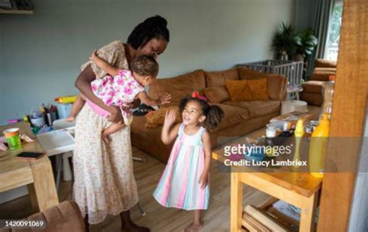 Baby girl letting her mother know she's saying vitamin wrong