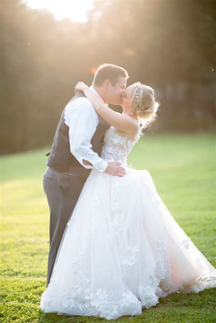 Bride, Photograph, Gown, Wedding dress, Ceremony, Dress, Facial expression, Formal wear, Bridal clothing, Wedding, 