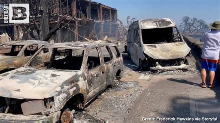 Burned cars line the streets of Lahaiana. Photo / Getty Images