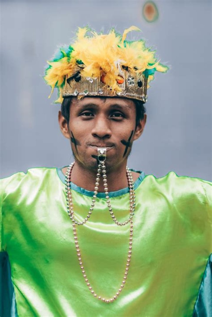 Carnival, Yellow, Event, Festival, Headgear, Hat, Fashion accessory, Smile, Samba, Costume, 