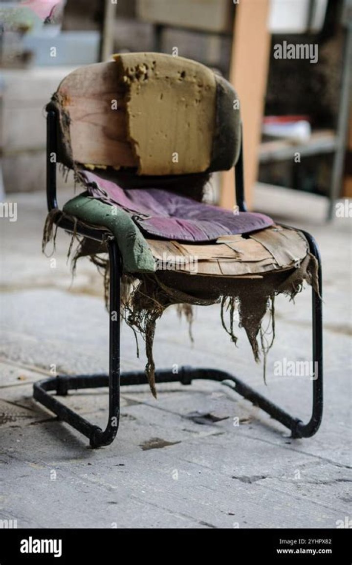 chair with ripped fabric