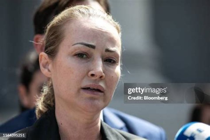 Chauntae Davies, an alleged victim of Jeffrey Epstein, speaks to members of the media outside of federal court in New York. Photo / Getty Images 