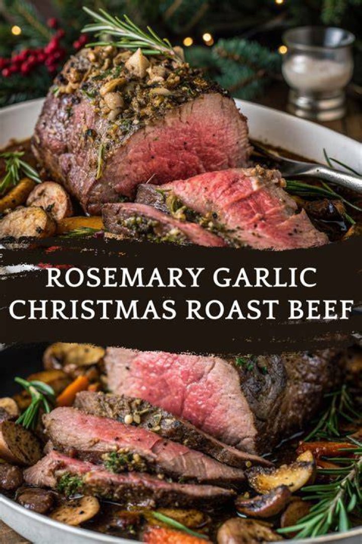 Christmas dinner. Roasted rosemary and garlic leg of lamb and roast potatoes Christmas dinner. Roasted rosemary and garlic leg of lamb and roast potatoes