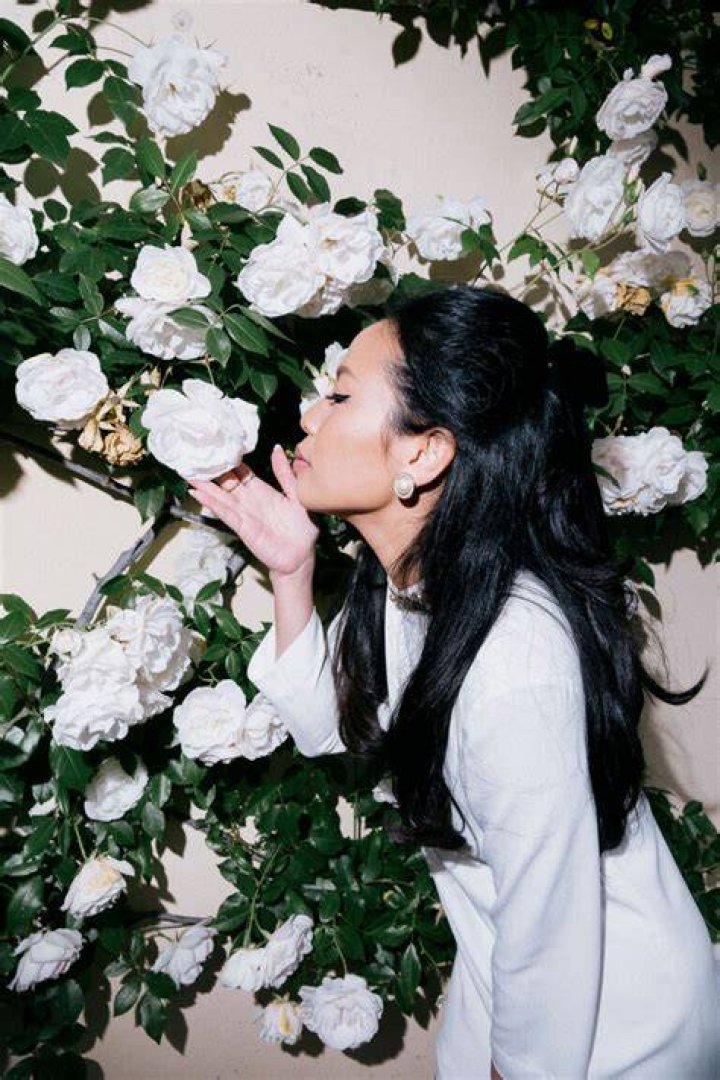 clare ngai wears an asymmetrical navy slip dress