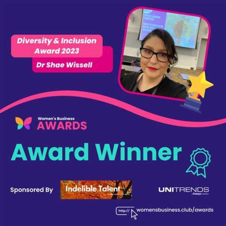 Dr. Mayorga presents Diversity Award to Dr. Cleary