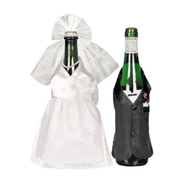 Dress, Wine glass, Ceremony, Distilled beverage, Bouquet, Wine bottle, Rose, Tuxedo, Stemware, Champagne stemware, 