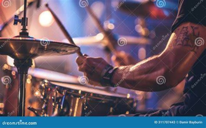 Drum, Event, Trousers, Entertainment, Performing arts, Coat, Idiophone, Musician, Dress, Suit, 