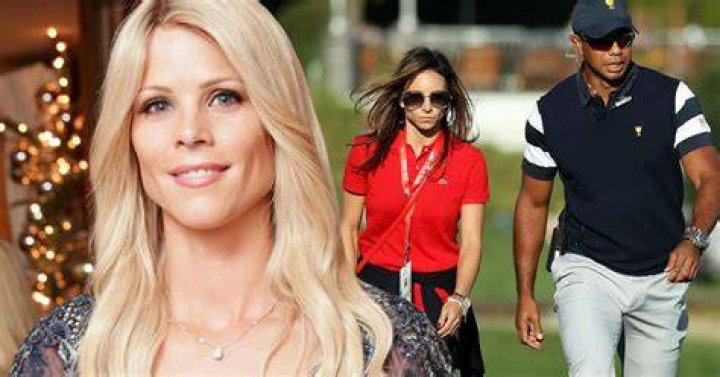  Elin Nordegren, left, and Erica Herman following Tiger Woods and son Charlie around the course. Photo /AP