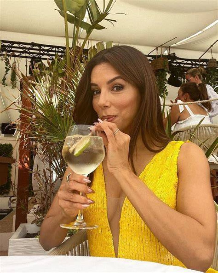 Eva Longoria Glows in a Yellow Sequined Gown
