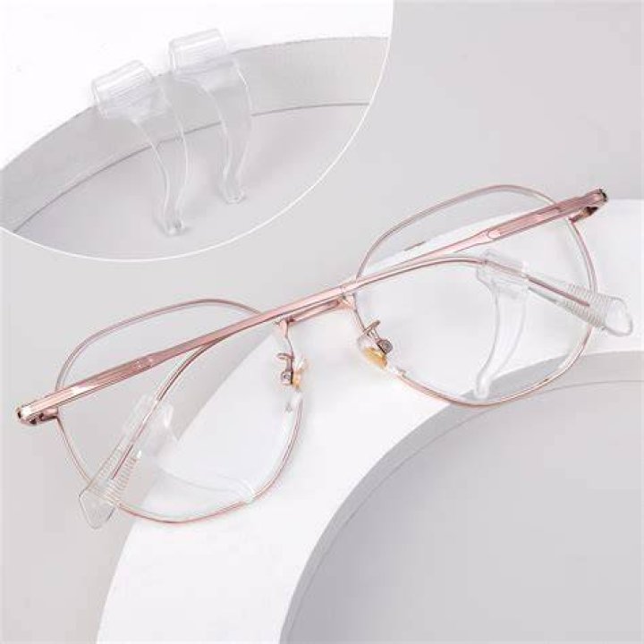 Eyewear, Ear, Glasses, Jewellery, Style, Fashion accessory, Earrings, Black hair, Logo, Fashion, 