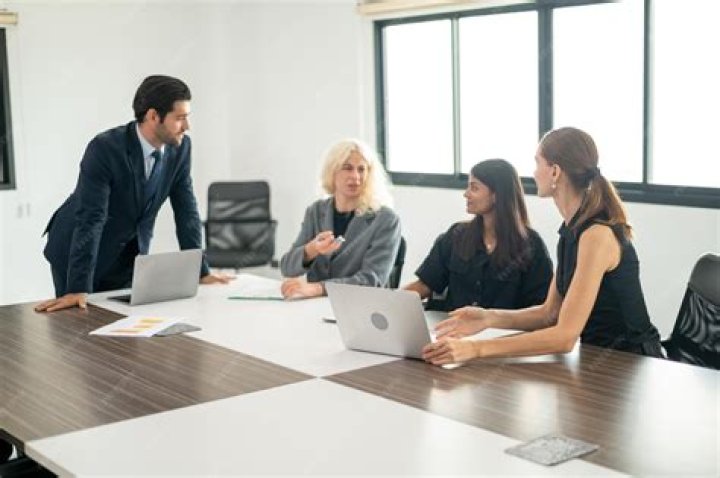 Face, People, Table, Formal wear, Interaction, Suit, Jewellery, White-collar worker, Conversation, Employment, Face, People, Table, Formal wear, Interaction, Suit, Jewellery, White-collar worker, Conversation, Employment,