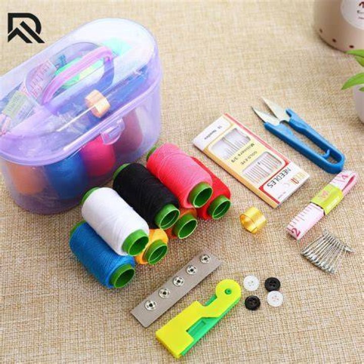 Furniture, Dress, Sewing, Box, Household appliance accessory, One-piece garment, Sewing machine, Shipping box, Day dress, Vintage clothing, 
