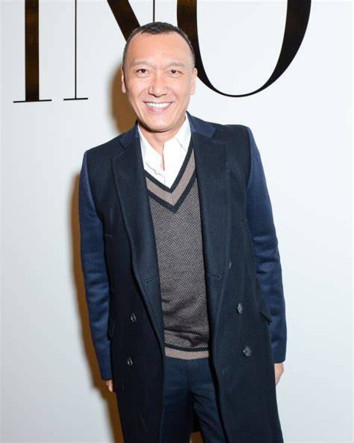 joe zee in a black suit at fit