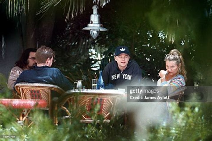  Leonardo Dicaprio Having Lunch With His Step-Brother, Adam, Father, George (Left) And Mother, Irmelin in 1999. Photo / Getty 