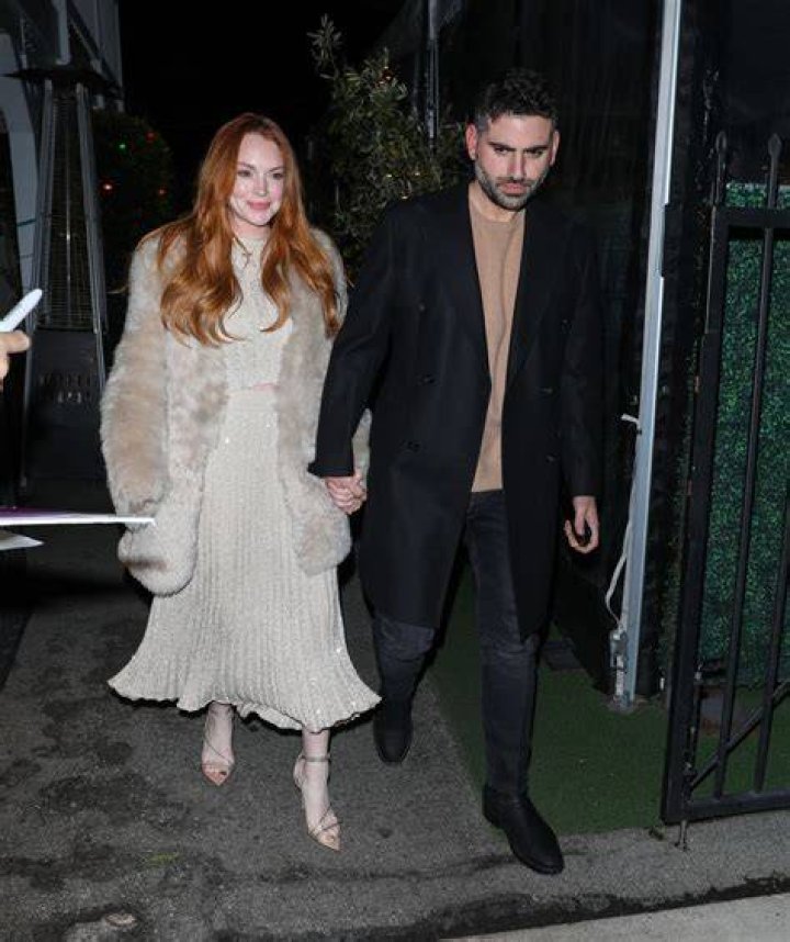 Lindsay Lohan Shimmers in Champagne Co-ord and Luscious Fur Coat