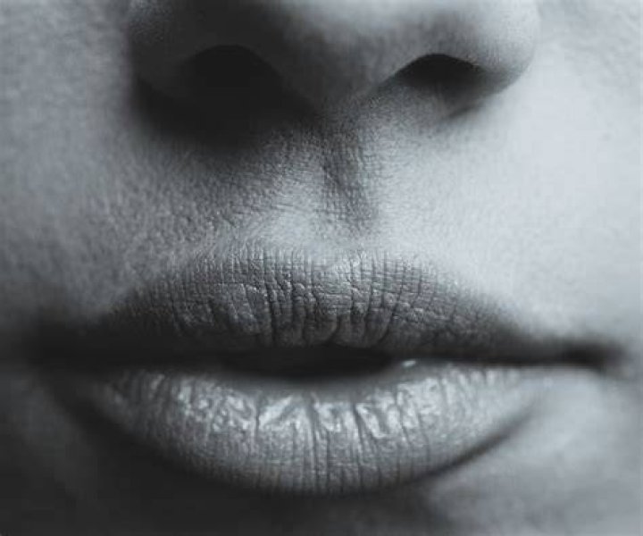 Lip, Mouth, Hairstyle, Eyebrow, Monochrome photography, Facial expression, Style, Jaw, Black-and-white, Iris, 