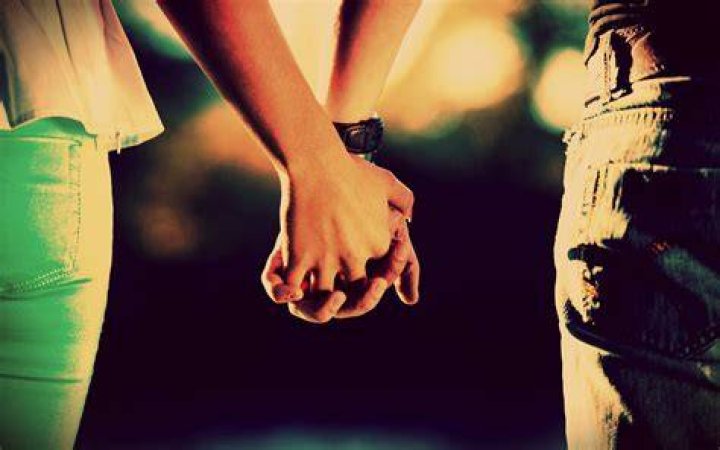 Holding hands lovers couple holding hands