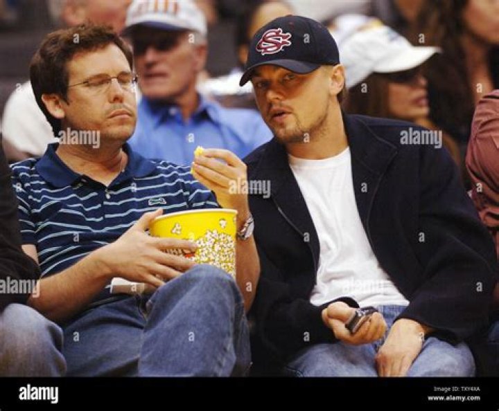 Lucas Hass, Adam Farrar (Leo's brother), Leonardo DiCaprio and Kevin Dilon (L-R) sit courtside as they attend the Los Angeles Lakers/Miami Heat NBA game. Photo / Getty 