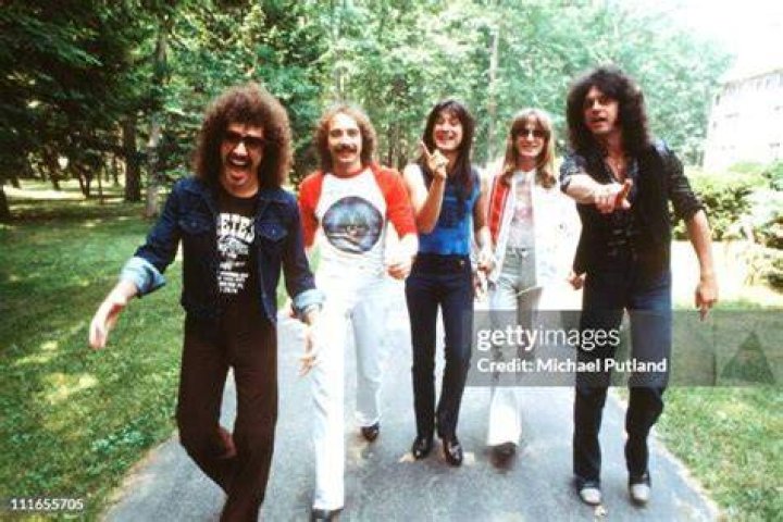 Neal Schon, Steve Smith, Steve Perry, Ross Valory, and Gregg Rolie of Journey rock band during a New York photoshoot in 1979.