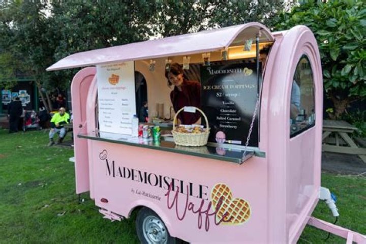 Noemie Alonso, from Mademoiselle Waffle, makes homemade Belgian waffles from her caravan and stall.