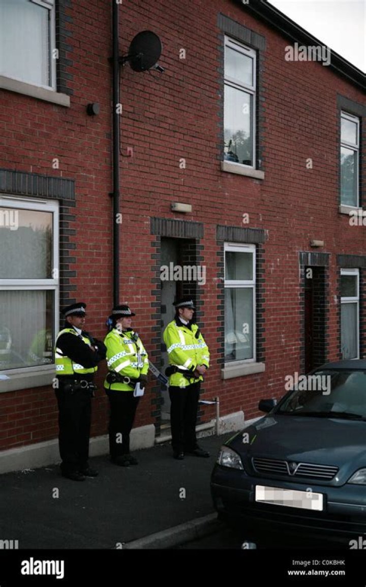 Police stand guard outside the hotel where drummer Taylor Hawkins was found dead in Bogota. Photo / AP