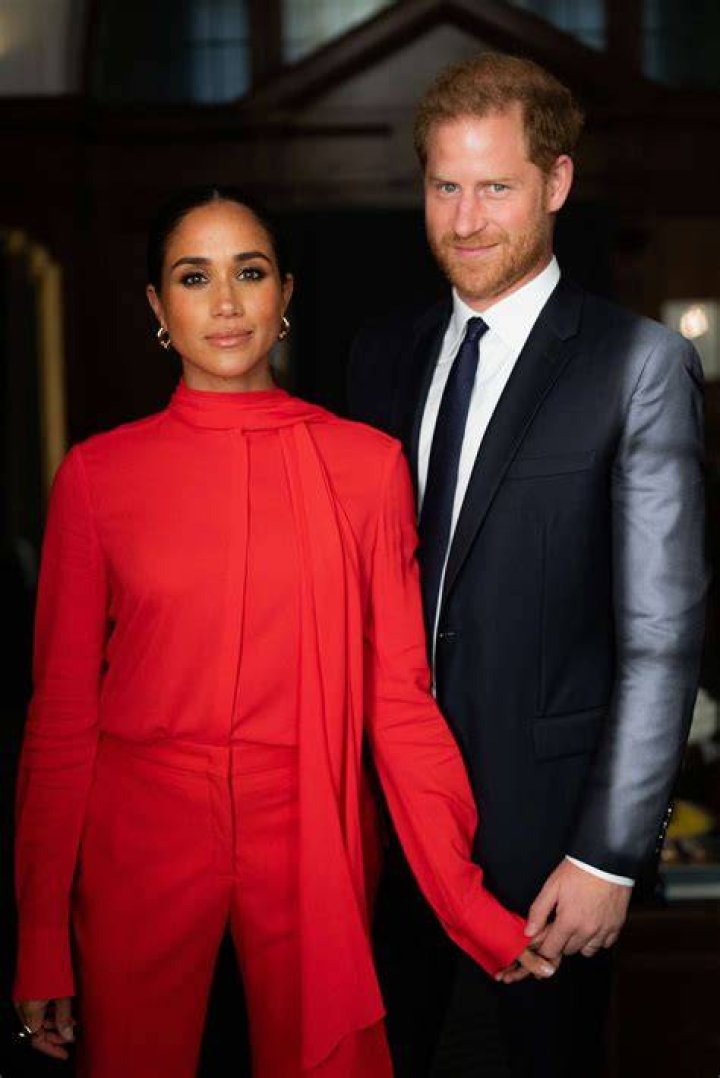 Prince Harry and Meghan with their children Archie and Lilibet, in 2021 Christmas card.