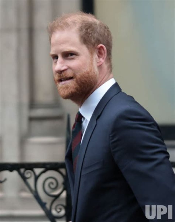 Prince Harry leaves the High Court after giving evidence in London against a tabloid publisher he accuses of phone hacking and other unlawful snooping. Photo / Alberto Pezzali, AP