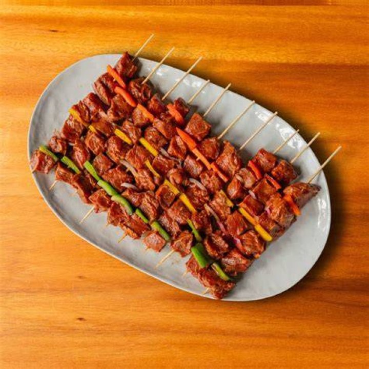 Raw beef skewers ready for grilling Raw beef skewers ready for grilling