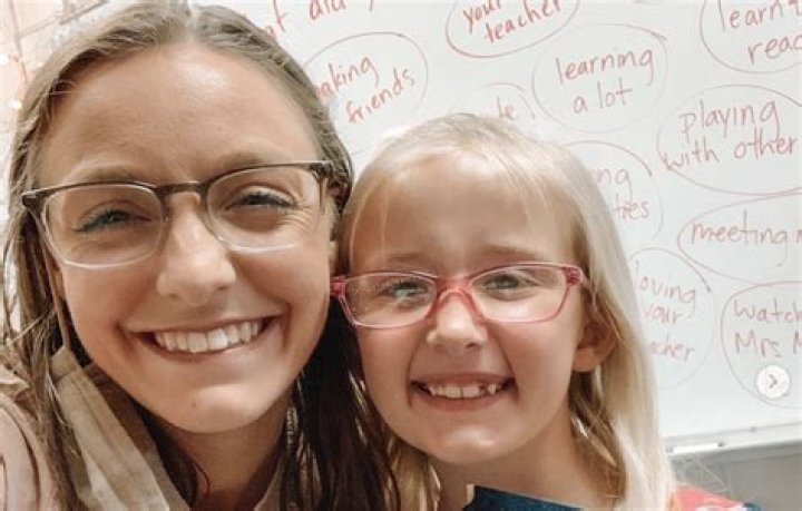 Single teacher adopts 5-year-old pupil.