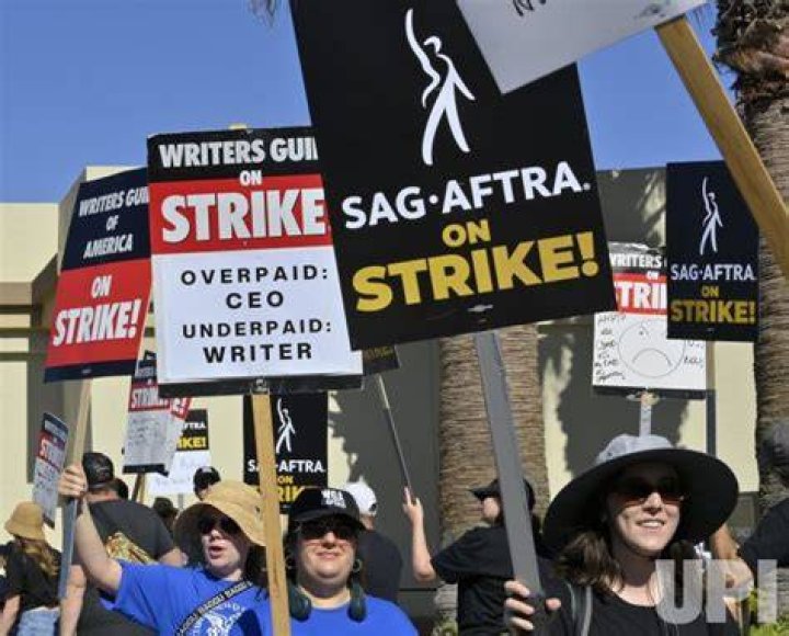 Striking writers and actors take part in a rally outside Paramount studios in Los Angeles on July 14. This marks the first day actors formally joined the picket lines, more than two months after screenwriters began striking in their bid to get better pay and working conditions. (AP Photo/Chris Pizzello)