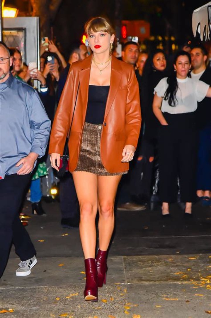Taylor Swift Does Fall's Trendiest Palette in a Brown Leather Jacket and Miniskirt