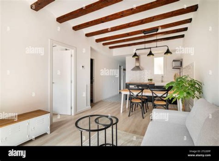 The living room is adjacent to the bathroom and laundry area. Photo / Boxabl