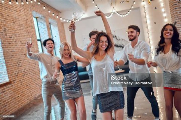 Three people having a party on a video call
