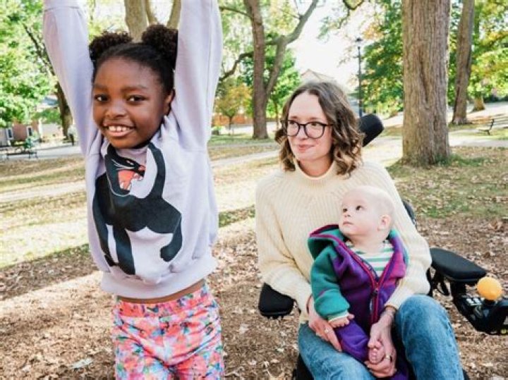 TikTok user @neokirchbaby, disabled mom, and her three boys