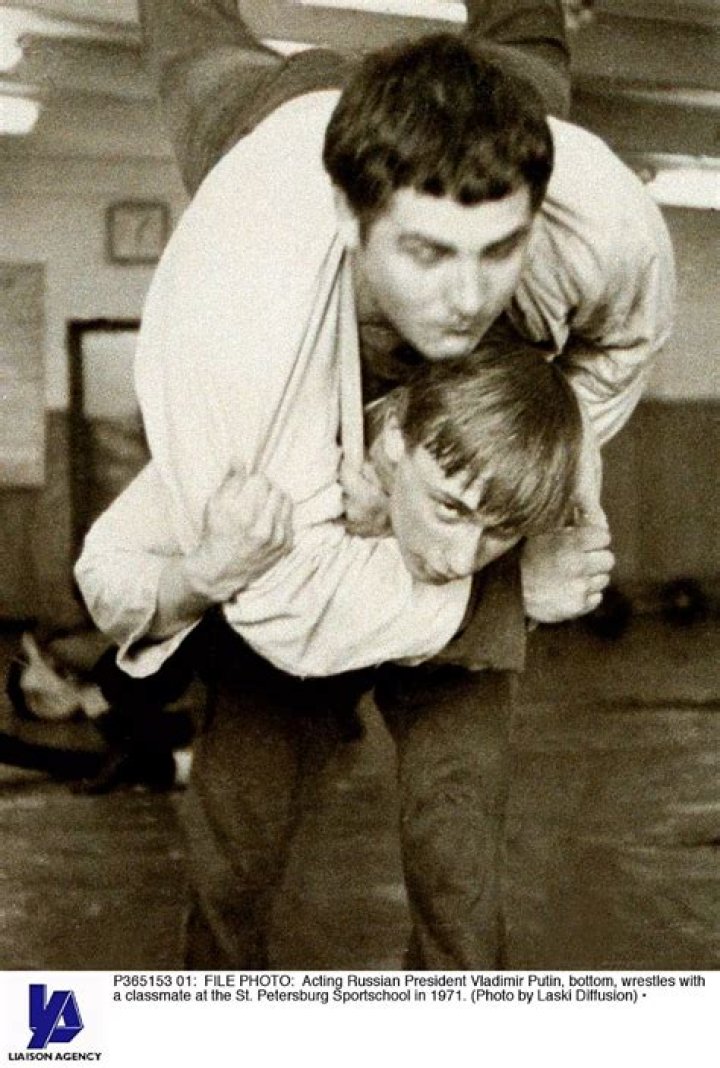 Vladimir Putin (bottom) wrestles with a classmate at the St Petersburg Sport school in 1971. Photo / Laski Diffusion, Getty Images