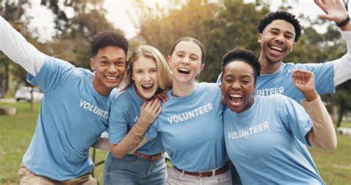 Volunteer taking a photo of a tortoise