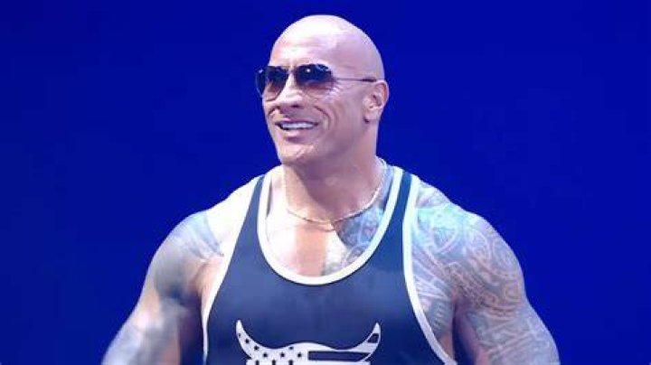 Watch The Rock Return to WWE and Challenge Roman Reigns to a Grudge Match