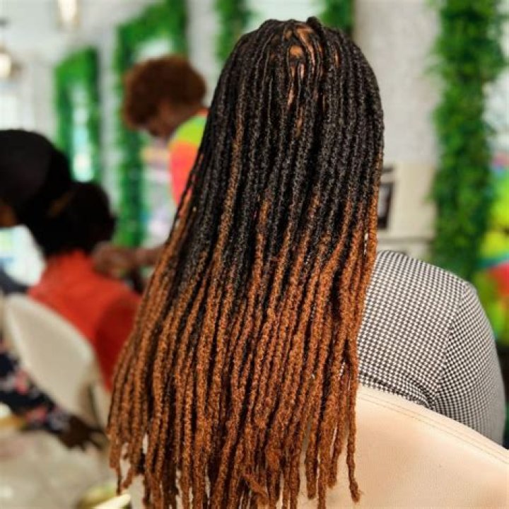 Woman gets spiky artificial dreadlocks at the salon Woman gets spiky artificial dreadlocks at the salon