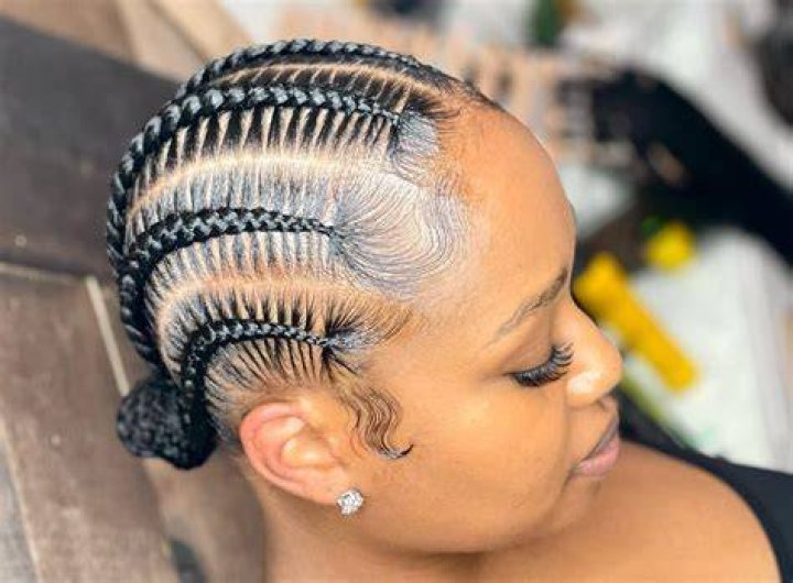 woman relaxes braids
