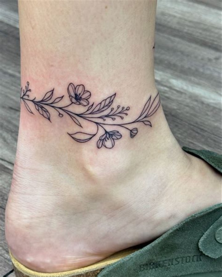 Wrap-around ankle tattoo Wrap-around ankle tattoo