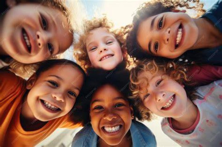 Young children smiling and having fun