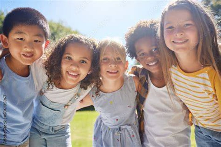 Young group of children smiling at camera