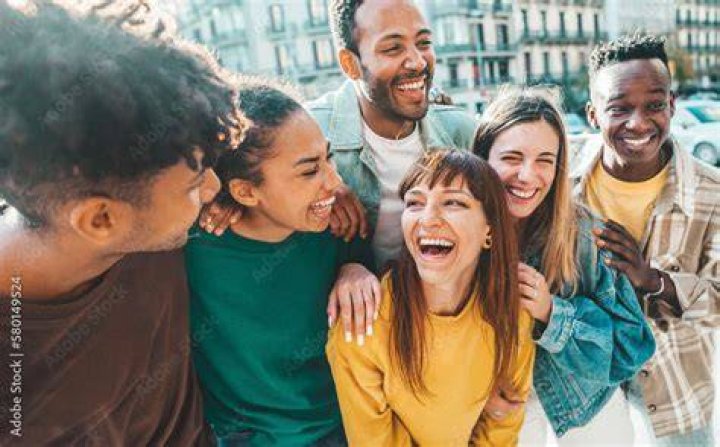 Young people laughing and enjoying the summer day